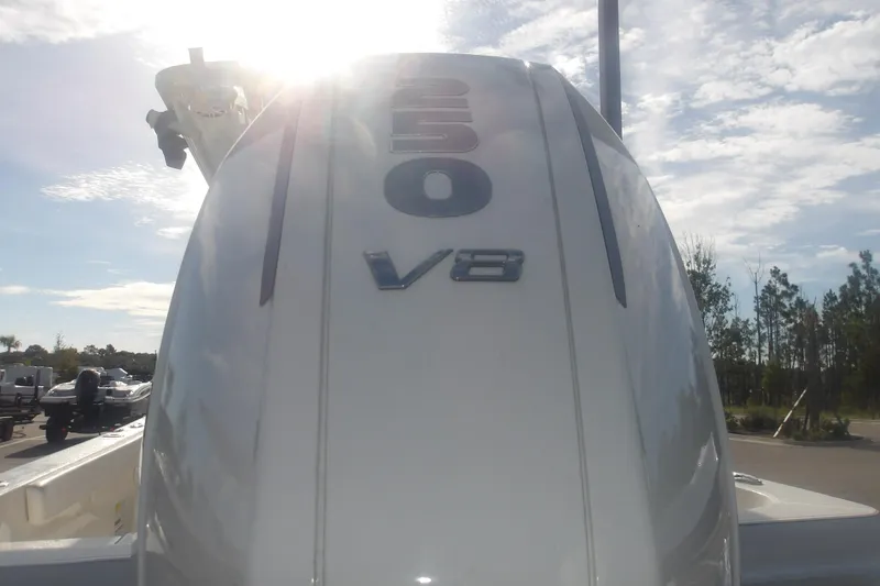 Slide: The Image of Outboard motor of 2025 Ranger 2360 Bay boat under sunny sky. - 11