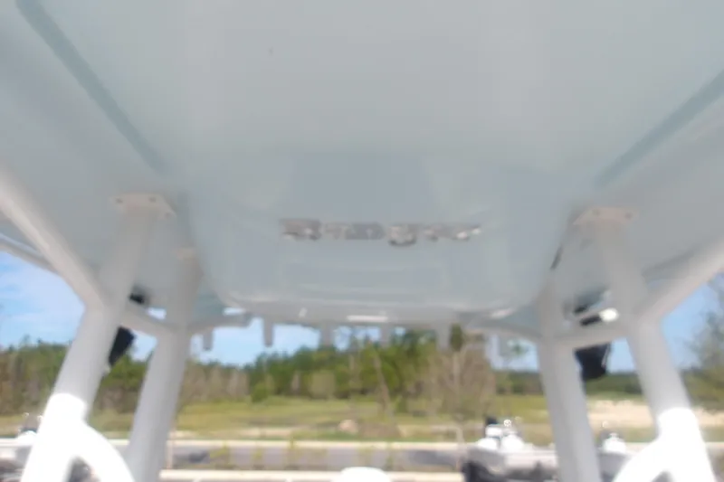 Slide: The Image of 2025 Ranger 2360 Bay boat interior with overhead view, showcasing structural details. - 23