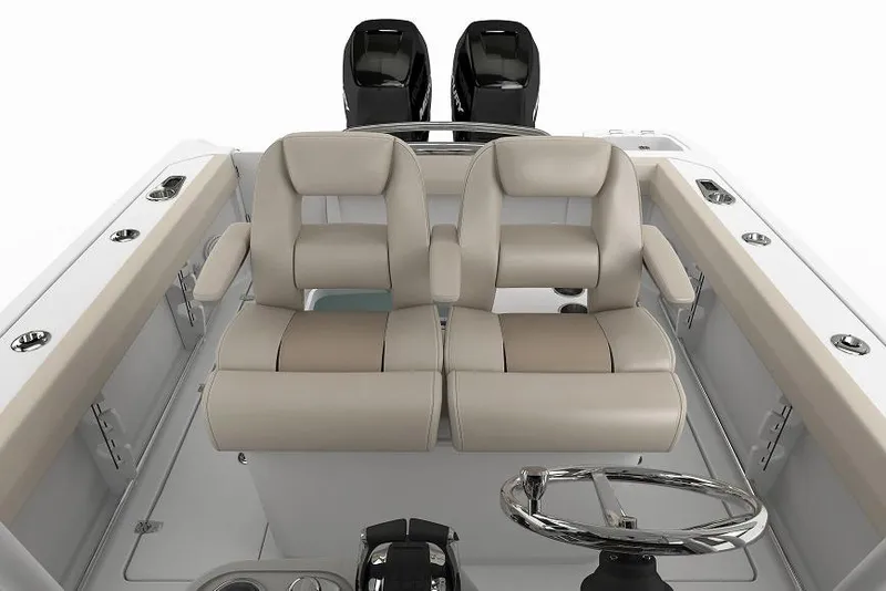 Slide: The Image of Manufacturer Provided Image: 2016 Boston Whaler 250 Outrage boat interior with dual seats and steering wheel. - 29