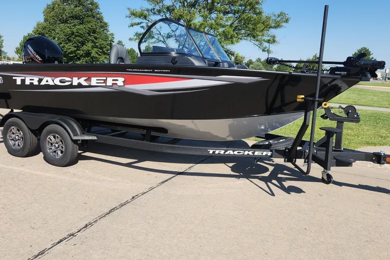 The Image of 2026 Tracker Targa V-18 Combo boat on trailer, parked outdoors. - 0