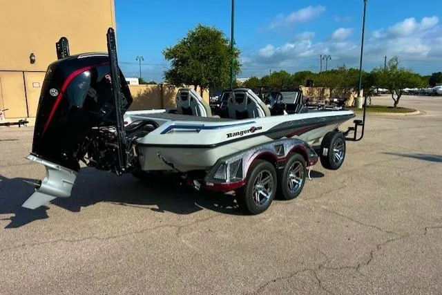 Slide: The Image of 2025 Ranger Z521R Cup-Equipped boat on trailer, parked outdoors. - 4