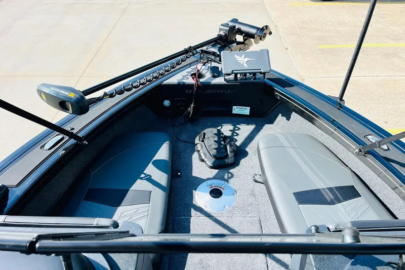 Slide: The Image of 2026 Tracker Targa V-18 Combo boat interior with seating and equipment. - 12
