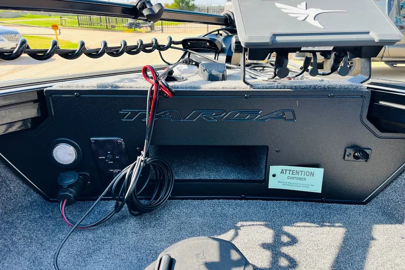 Slide: The Image of 2026 Tracker Targa V-18 Combo boat dashboard with control panel and wiring. - 23