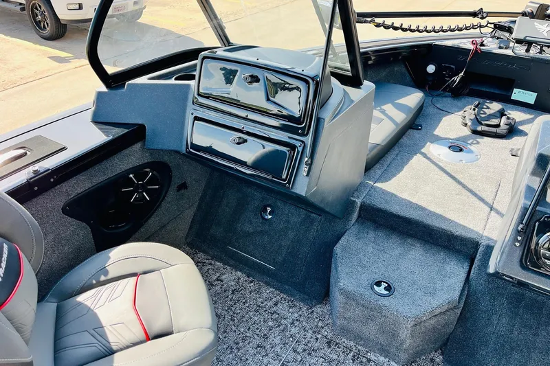 Slide: The Image of 2026 Tracker Targa V-18 Combo boat interior with seating and storage compartments. - 31