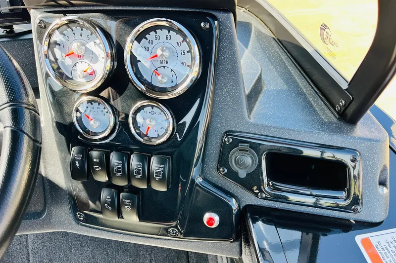 Slide: The Image of Dashboard of 2026 Tracker Targa V-18 Combo boat with gauges and controls. - 46