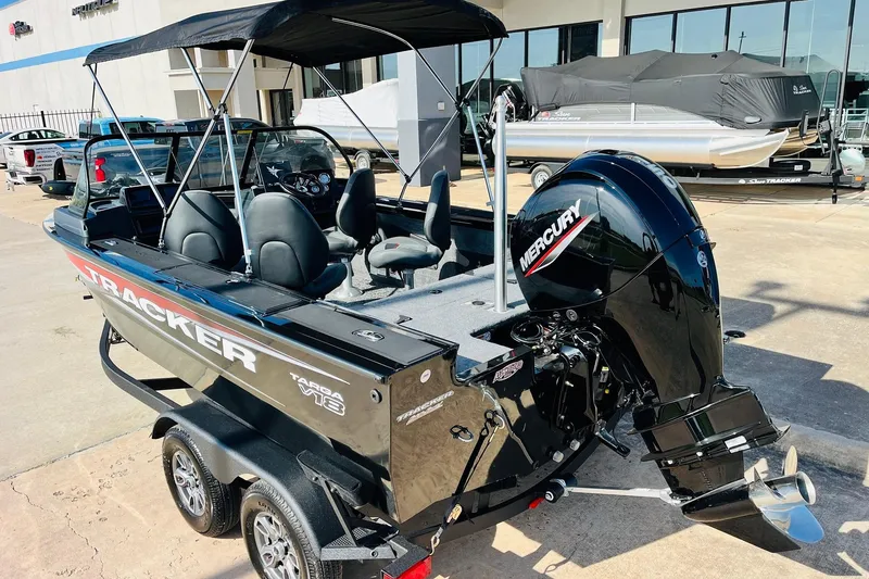 Slide: The Image of 2026 Tracker Targa V-18 Combo boat with Mercury engine on trailer. - 8