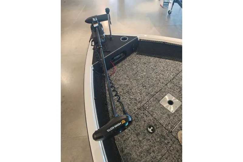 Slide: The Image of 2025 Ranger VS1682SC Reata boat with Minn Kota trolling motor on carpeted deck. - 6