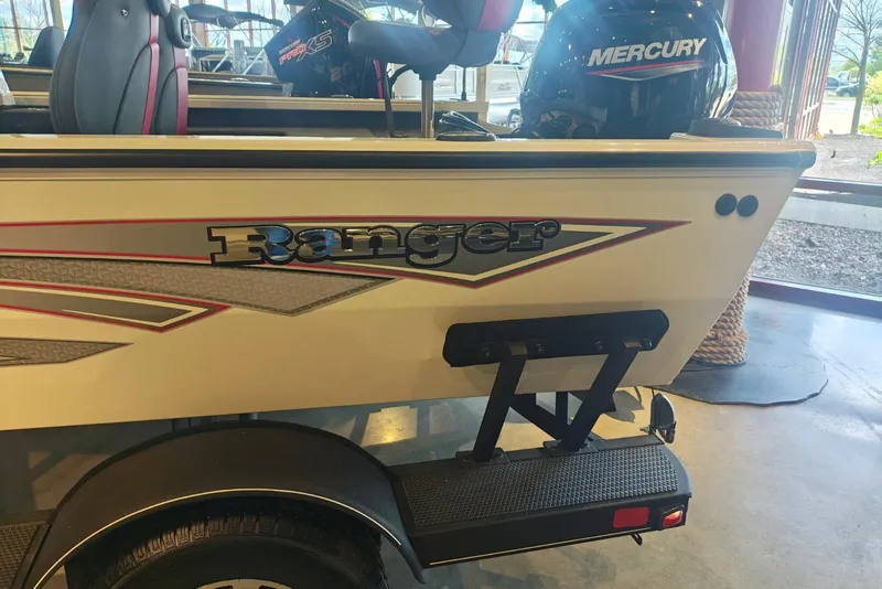 Slide: The Image of 2025 Ranger VS1682SC Reata boat with Mercury engine in showroom. - 8