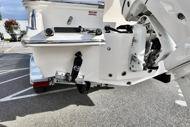 Slide: The Image of Rear view of 2026 Pioneer 220 Baysport boat on trailer, showcasing engine mount. - 2
