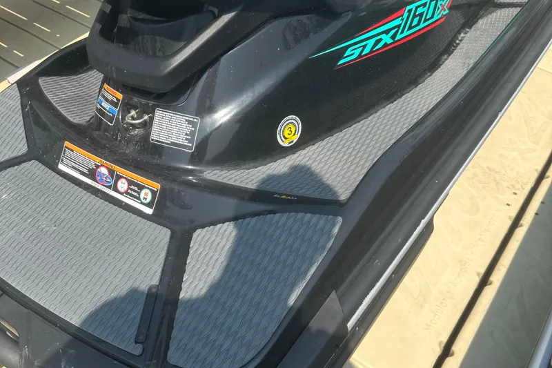 Slide: The Image of 2021 Kawasaki Jetski STX 160X, close-up of deck and branding. - 4