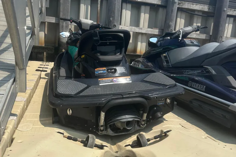 Slide: The Image of 2021 Kawasaki Jetski STX 160X docked beside a Yamaha watercraft. - 5