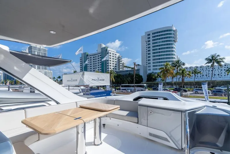 Slide: The Image of Luxury yacht Princess S65 2026 with modern design and city view. - 37