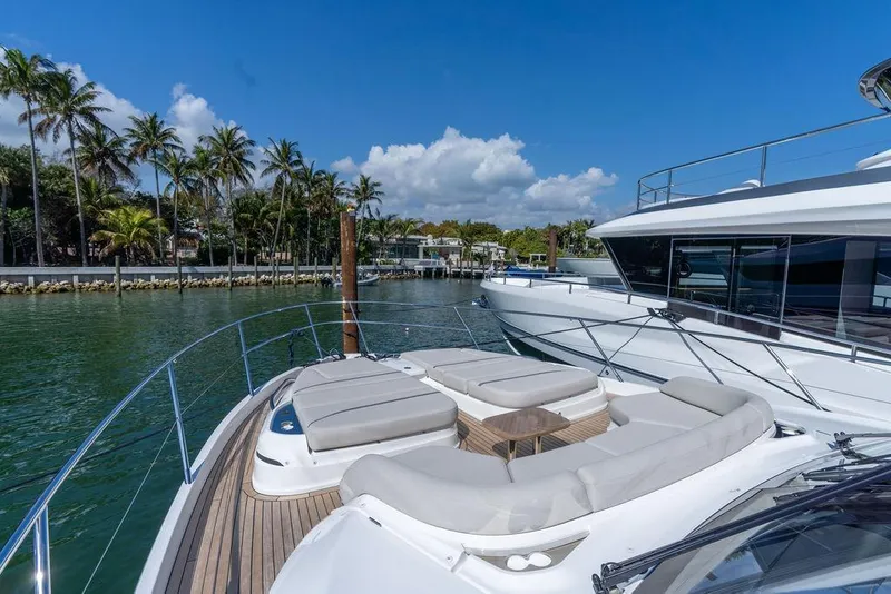 Slide: The Image of Luxury yacht Princess S65 from 2026 in tropical setting. - 44