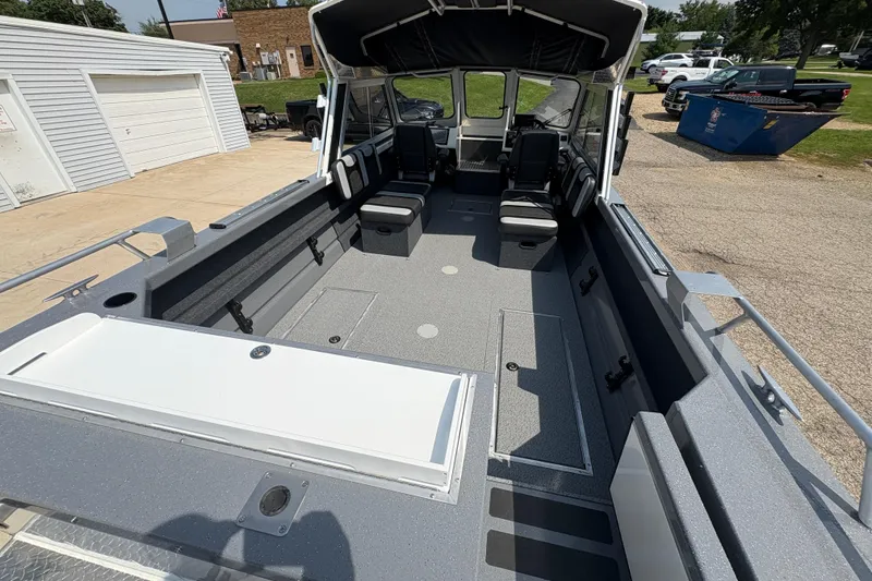 Slide: The Image of 2026 Lund 210 HG boat interior with spacious seating and modern design. - 43