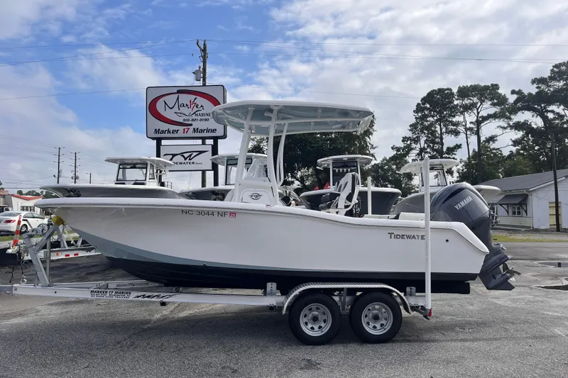 The Image of 2024 Tidewater 210 LXF boat on trailer at Marker 17 Marine dealership. - 0