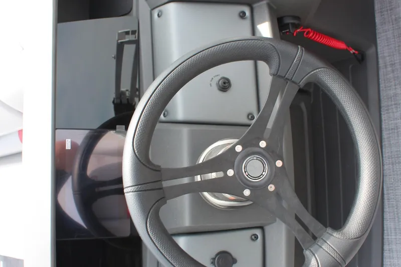 Slide: The Image of Steering wheel of 2026 Sun Tracker Party Barge 20 DLX pontoon boat. - 11
