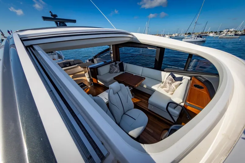 Slide: The Image of Luxurious Princess V55 Express yacht 2026 in harbor at sunset. - 20