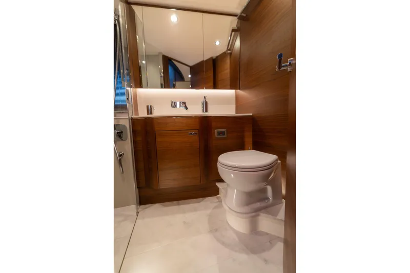 Slide: The Image of Luxurious bedroom on the 2026 Princess V55 Express yacht. - 28