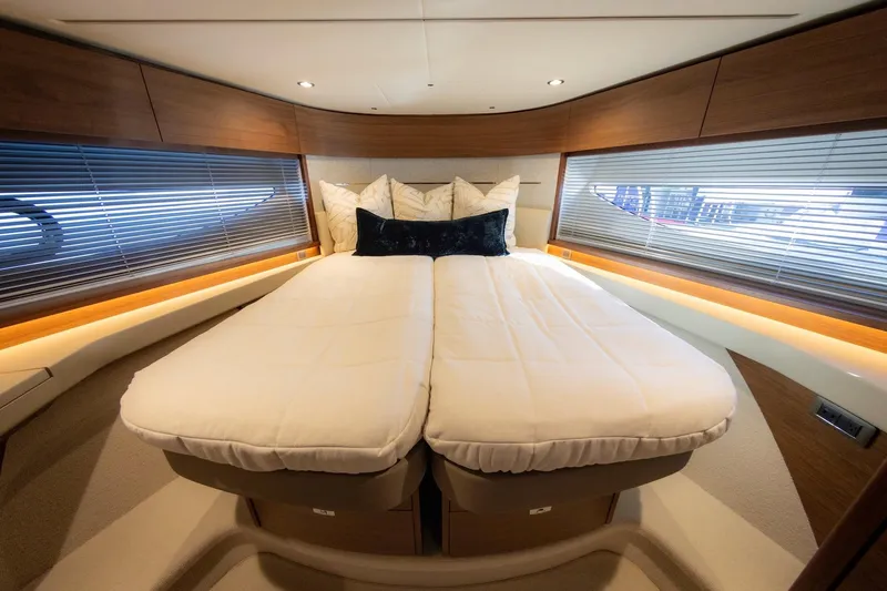 Slide: The Image of Luxurious bedroom on the 2026 Princess V55 Express yacht. - 33