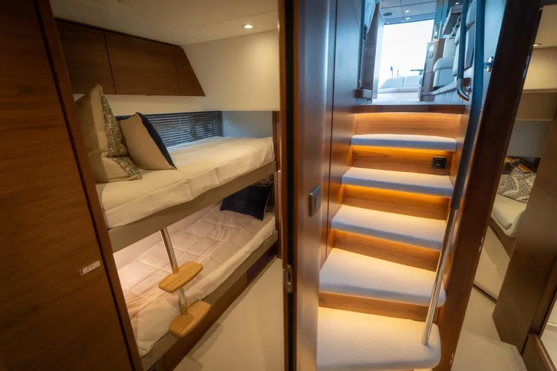 Slide: The Image of Luxurious bedroom in the 2026 Princess V55 Express yacht. - 36