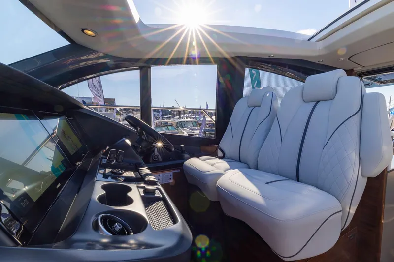 Slide: The Image of Interior of Princess V55 Express yacht with bunk beds and illuminated staircase. - 37