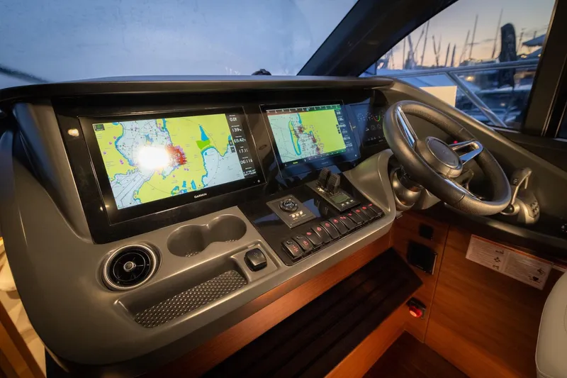 Slide: The Image of Interior view of the 2026 Princess V55 Express cockpit. - 42