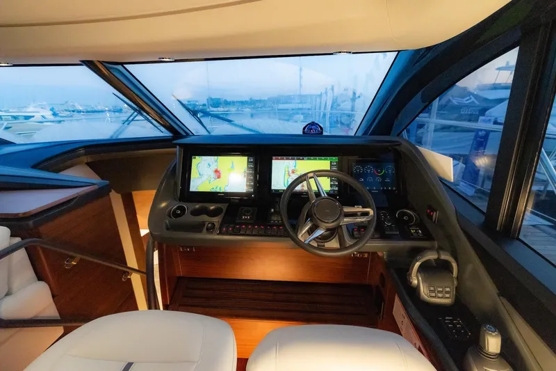 Slide: The Image of Interior view of the 2026 Princess V55 Express yacht cockpit. - 43