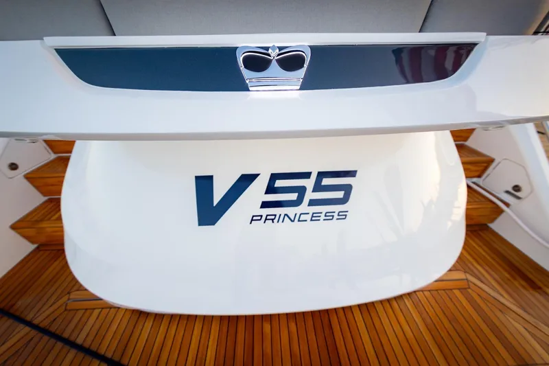 Slide: The Image of Luxurious deck of Princess V55 Express yacht, 2026 model, under sunny skies. - 49