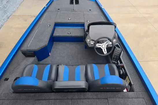 Slide: The Image of 2026 Vexus AVX189D boat interior with blue and gray seating and steering console. - 7