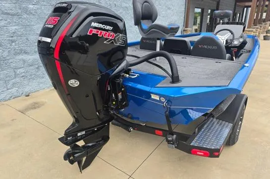 Slide: The Image of 2026 Vexus AVX189D boat with Mercury Pro XS engine, blue exterior, parked on concrete. - 8