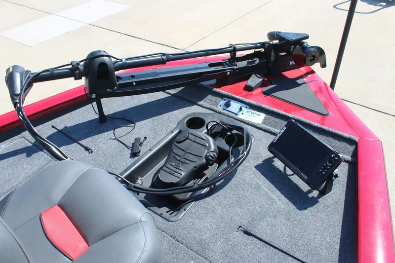 Slide: The Image of 2026 Tracker Pro Team 195 boat deck with trolling motor and navigation system. - 13