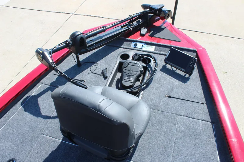 Slide: The Image of 2026 Tracker Pro Team 195 boat deck with seat, control panel, and navigation system. - 21