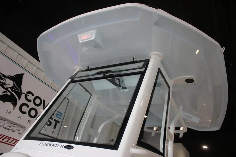 Slide: The Image of 2026 Tidewater 282 CC Adventure boat with sleek design and modern features. - 21