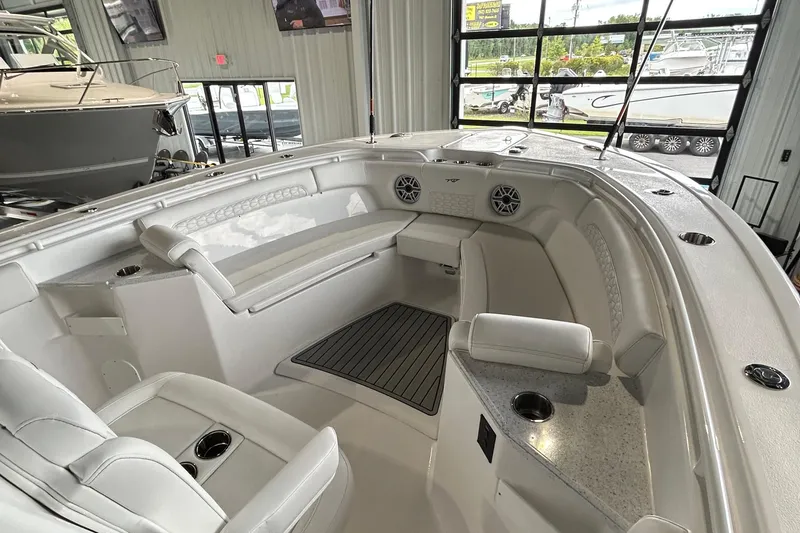 Slide: The Image of 2026 Tidewater 282 CC Adventure boat interior with luxurious seating and modern design. - 5