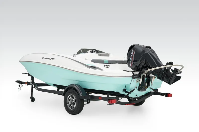 Slide: The Image of Manufacturer Provided Image: 2025 Tahoe T16 boat on trailer, featuring sleek design and outboard motor. - 53