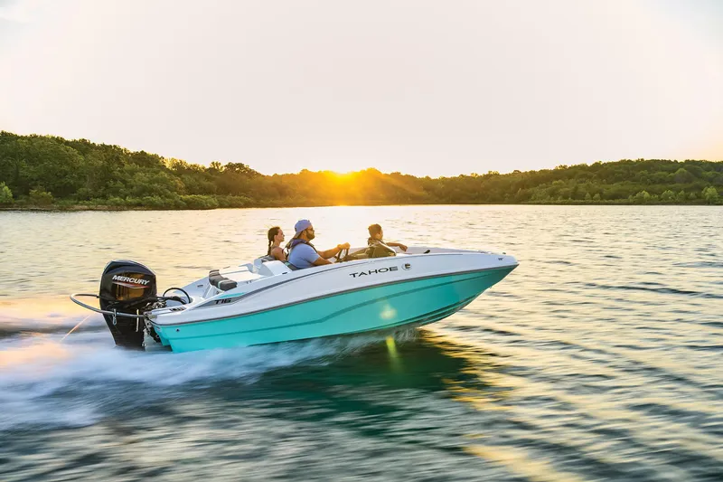 Slide: The Image of Manufacturer Provided Image: 2025 Tahoe T16 boat cruising on a lake at sunset with passengers. - 62
