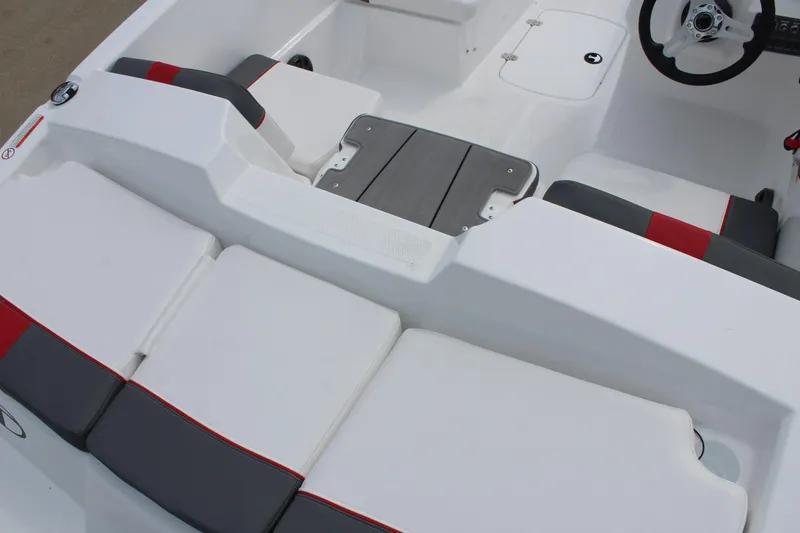Slide: The Image of 2026 Tahoe T16 boat interior with white and red seating, modern design. - 9