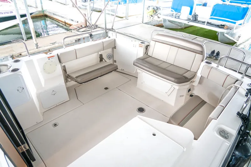 Slide: The Image of 2020 Cutwater C28 boat interior with spacious seating and modern design. - 14