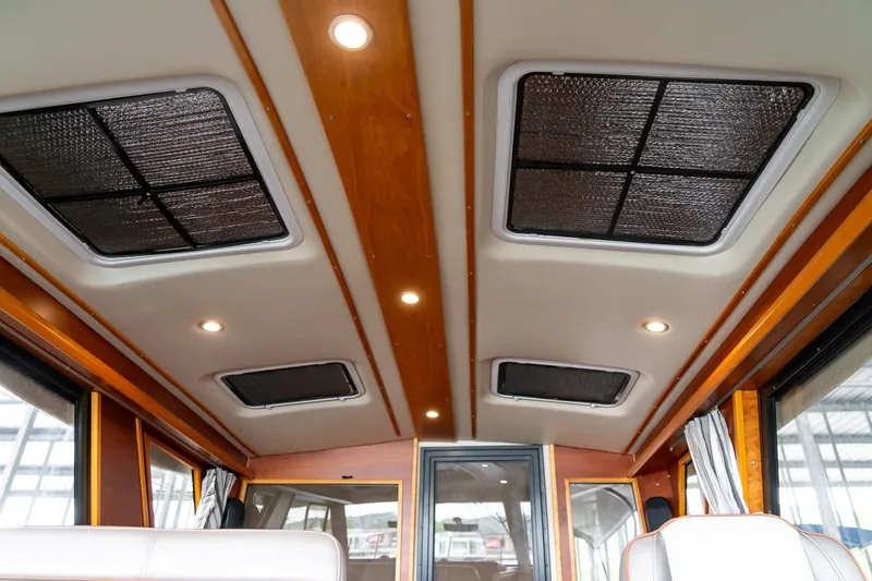Slide: The Image of Interior ceiling of 2020 Cutwater C28 boat with recessed lighting and ventilation panels. - 29