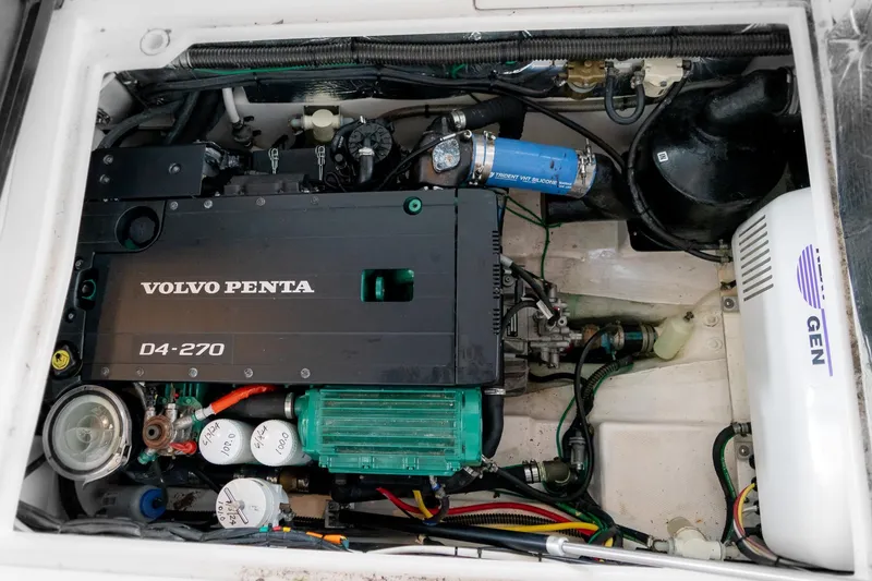 Slide: The Image of Engine compartment of a 2020 Cutwater C28 featuring a Volvo Penta D4-270 engine. - 41