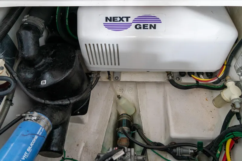 Slide: The Image of Engine compartment of a 2020 Cutwater C28 boat with Next Gen generator. - 42