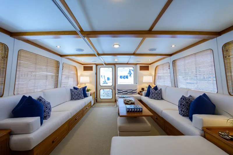 Slide: The Image of Luxurious interior of 2003 New England Boatworks Enclosed Raised Pilothouse with elegant seating. - 10