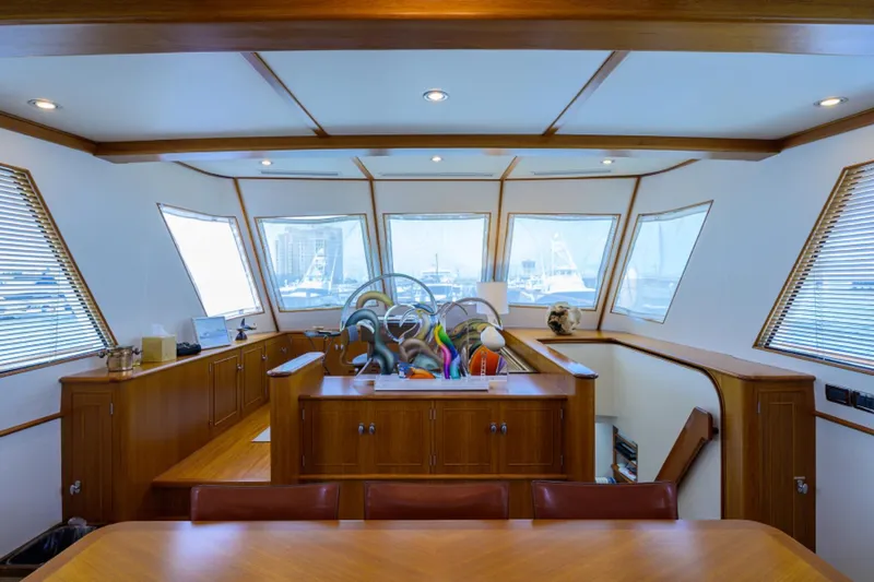 Slide: The Image of Luxurious 2003 New England Boatworks Enclosed Raised Pilothouse interior with panoramic windows. - 16