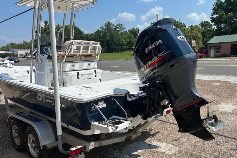 Slide: The Image of 2019 Sportsman Tournament 214 Bay Boat with Yamaha outboard motor on trailer. - 13