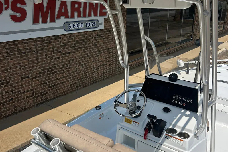 Slide: The Image of 2019 Sportsman Tournament 214 Bay Boat dashboard with steering wheel and controls. - 6