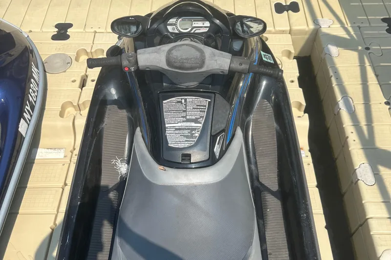 Slide: The Image of 2014 Yamaha WaveRunner VX Cruiser on a dock, top view. - 4