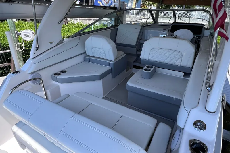 Slide: The Image of 2024 Regal 26 XO boat interior with luxurious seating and modern design. - 13