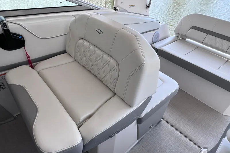 Slide: The Image of 2024 Regal 26 XO boat interior with luxurious seating and modern design. - 30