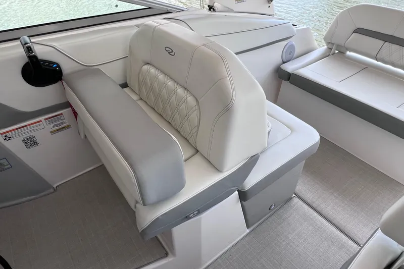 Slide: The Image of 2024 Regal 26 XO boat interior with luxurious seating and modern design. - 31