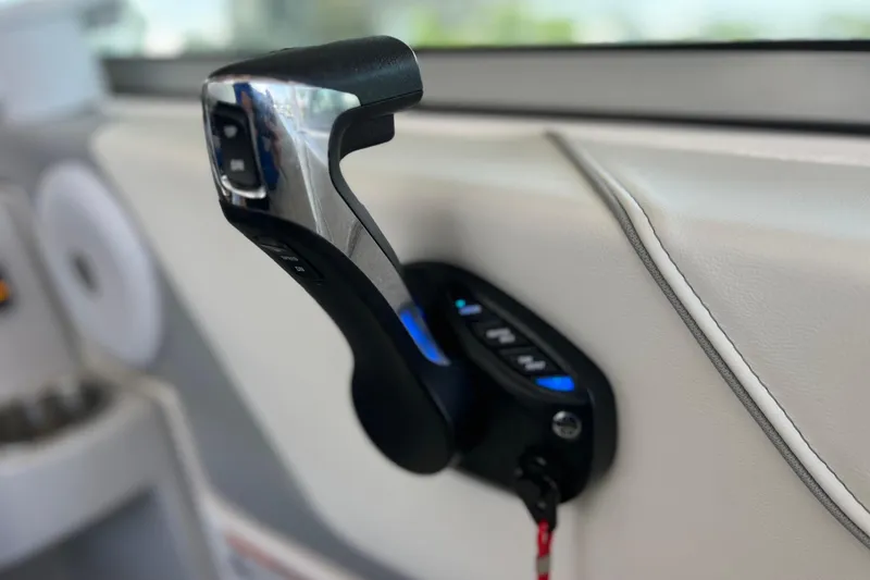 Slide: The Image of Throttle control of 2024 Regal 26 XO boat, featuring sleek design and modern technology. - 32